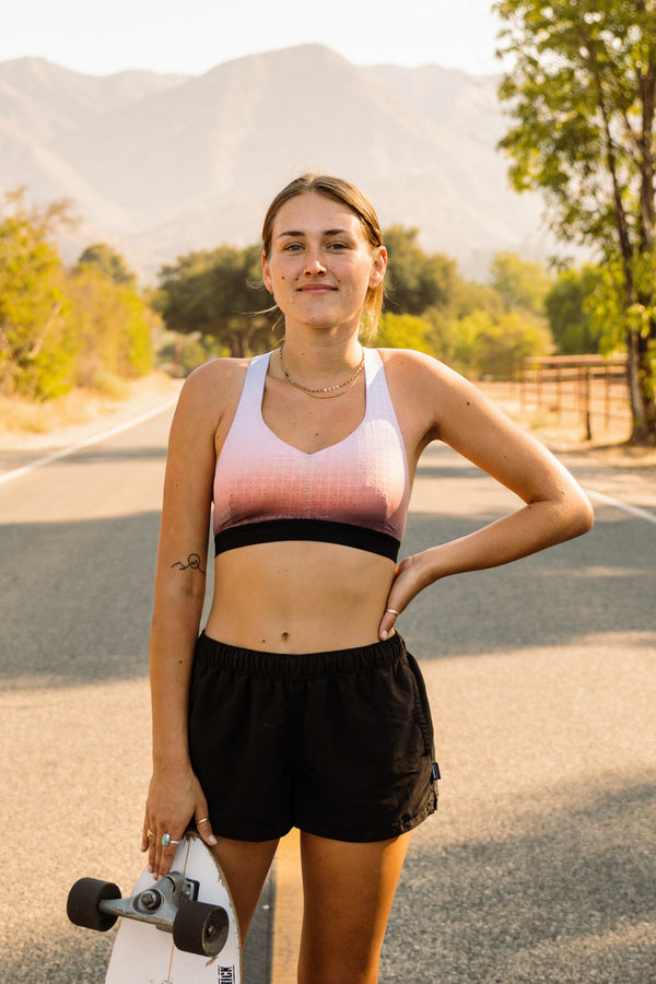 Lume Six Alta Medium Impact Sports Bra Sunrise Front Skateboard